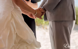 The couple hold hands in the process of finally vowing their love together.