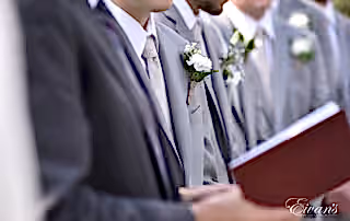 The groom stands at the alter awaiting his bride so they can begin their new life's together.